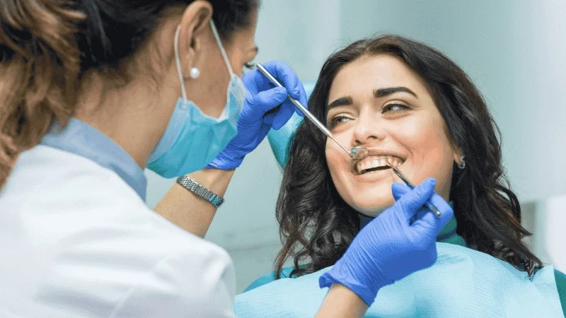 Tooth implant vs dentures