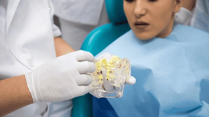 loose tooth implant symptoms